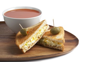 Fototapeta na wymiar egg sandwich with tomato soup