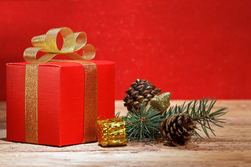 Fototapeta na wymiar Christmas gift on wooden background