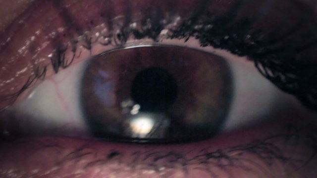 Woman Eye iris contracting