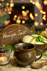 Traditional Christmas red borscht with meat filled dumplings