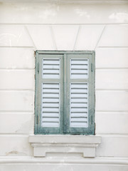 old Green wooden window in Thailand