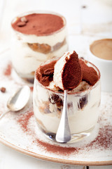 Tiramisu dessert in a glass. Traditional Italian.