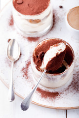 Tiramisu dessert in a glass. Traditional Italian.