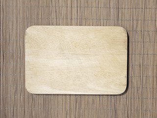 Cutting boards are made from wood, bamboo basketry woven