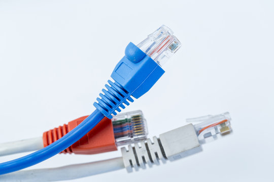 Colorful network cable with RJ45 connectors. Selective focus.