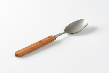 Table spoon with wooden handle