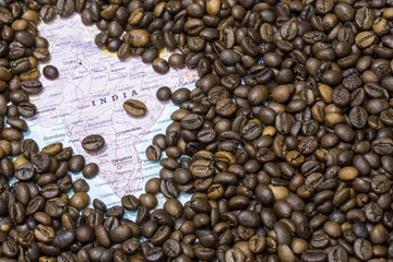 Map of India under a background of coffee beans