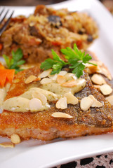 fried carp with almonds and sauerkraut for christmas eve
