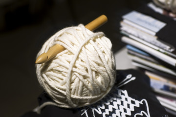 Ball of thread and the hook, still life. 