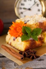 Cinnamon and anise star in front of apple pie