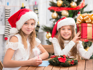 Happy children preparing for New Year and Christmas celebration