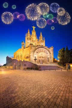 Beautiful fireworks under Tibidabo church on mountain in Barcelo