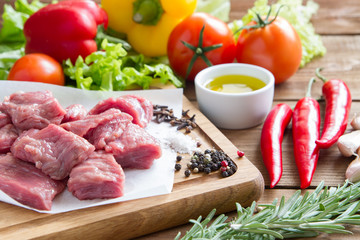 Raw, fresh beef with vegetables