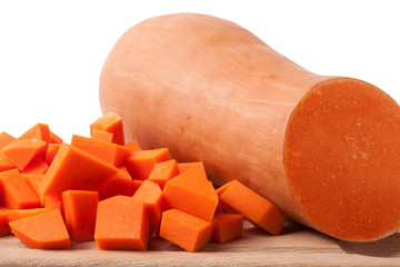Pumpkin vegetable cube slice isolated on white