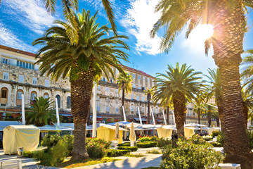 Fototapeta na wymiar Split main waterfront walkway palms and architecture