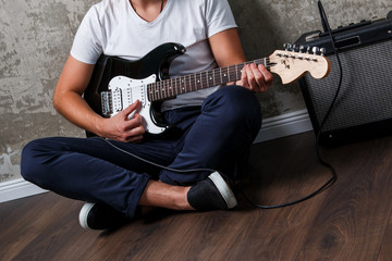 Stylish guy with a guitar