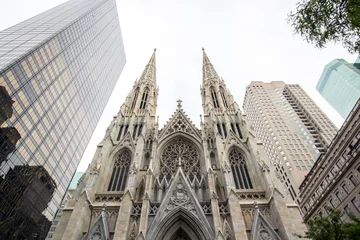 Foto op Canvas Saint Patrick cathedral in the middle of the midtown buildings of manhattan, new-york city © ydumortier