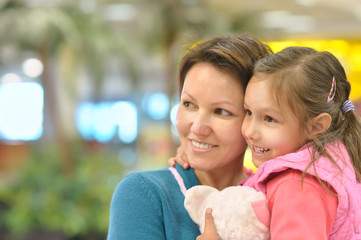 Little girl with  mother on  walk