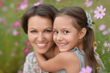girl with mother in park