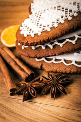 Close up heart shape gingerbread cookies  with spices on rustic table