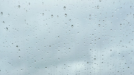 Drops of rain on glass background