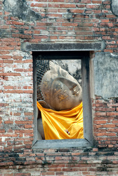 Ancient Reclining buddha in Wat Puthai Sawan temple in Ayutthaya Historical Park of Thailand,Thailand.