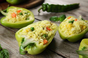 Stuffed peppers with vegetables on table close up