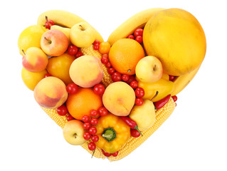 Colourful heart shaped fruit and vegetables composition isolated on white