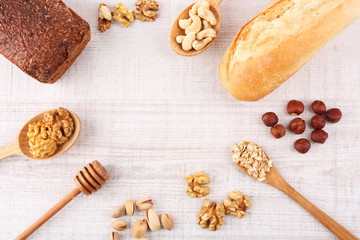 Healthy breakfast with bread, honey, nuts. Country breakfast concept