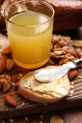 Healthy breakfast with bread, honey, nuts. Country breakfast concept
