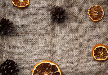 Background for a card, cloth, oranges and Christmas.