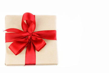 Gift box with red ribbon bow top view