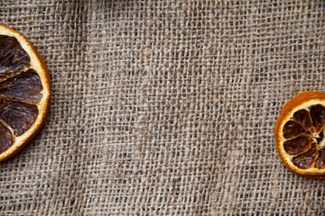 Background for a card, cloth, oranges and Christmas.