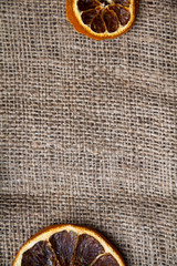 Background for a card, cloth, oranges and Christmas.