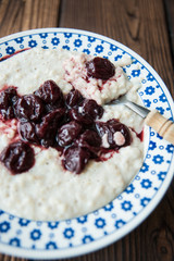 Rice milk porridge with canned cherries