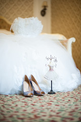 Fototapeta na wymiar Wedding preparations. Dress, shoes, jewelry bride