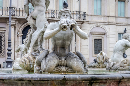 Memorial fountain Moro with marble sculptures in the Piazza Navona in Rome, capital of Italy