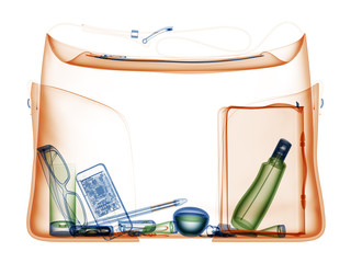 Woman hanbag under xray on security control.