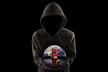 Faceless man holding time bomb with globe against black background