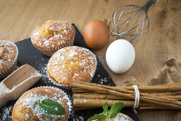 Homemade muffins with star anise, cinnamon and mint