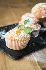 Homemade muffins with star anise, cinnamon and mint