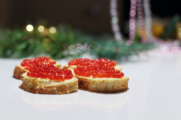Sandwich with red caviar. Festive breakfast
