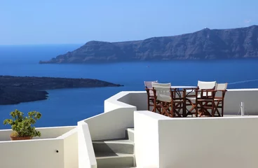 Crédence de cuisine en verre imprimé Restaurant restaurant in Santorini, overlooking the sea
