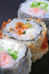 Macro closeup of fresh sushi combination assortment selection focus, shallow DOF