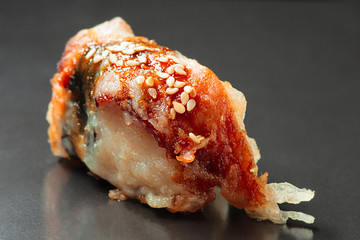 Sushi of fryed tuna, hot sushi roll macro