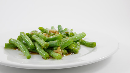 Thai style stir fried green beans on white plate. (3)