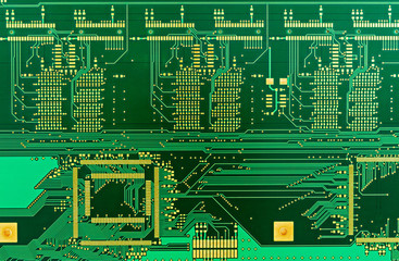The  blank green printed circuit board (PCB)