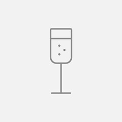 Glass of champagne line icon.