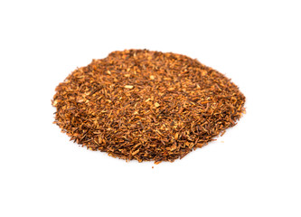 Dried rooibos herbal tea leaves over white background