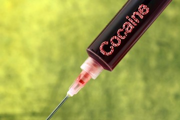 Cocaine addiction syringe concept